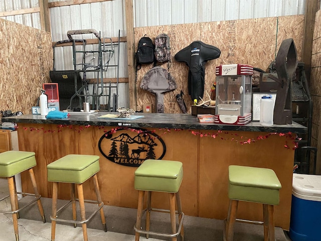 4441 Deckerville Rd, Lupton, MI 48635 - bar featuring concrete flooring