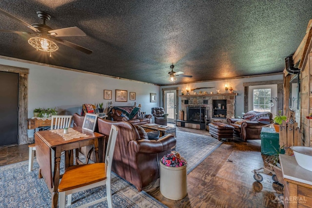4441 Deckerville Rd, Lupton, MI 48635 - living room with ceiling fan, a fireplace, wood finished floors, and ornamental molding