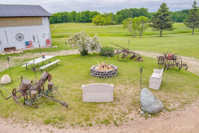 4441 Deckerville Rd, Lupton, MI 48635 - view of grassy yard featuring an outbuilding and an outdoor structure