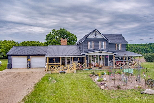 4441 Deckerville Rd, Lupton, MI 48635 - view of front of house featuring dirt driveway, covered porch, a chimney, and a metal roof