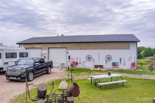 4441 Deckerville Rd, Lupton, MI 48635 - view of pole building featuring a yard