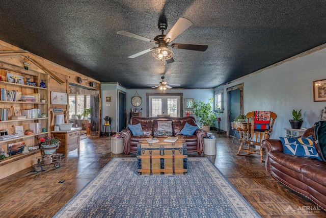 4441 Deckerville Rd, Lupton, MI 48635 - living room featuring wood finished floors, ceiling fan, and a textured ceiling