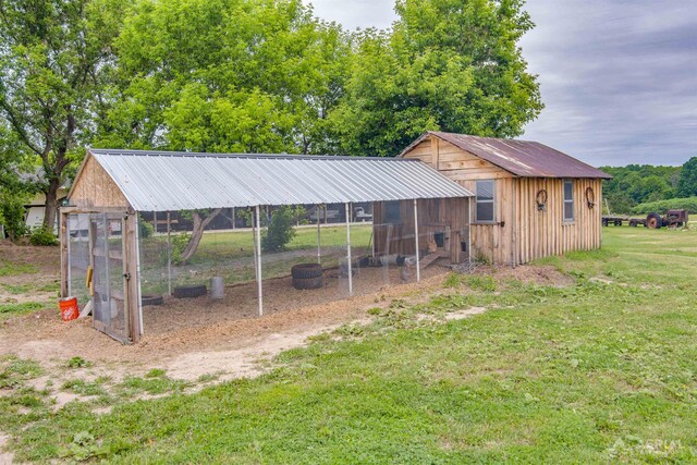 4441 Deckerville Rd, Lupton, MI 48635 - view of poultry coop featuring a yard