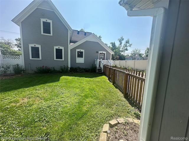 403 N Oak St, Durand, MI 48429 - back of property with a fenced backyard
