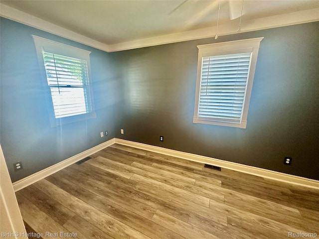 403 N Oak St, Durand, MI 48429 - spare room with wood finished floors