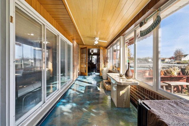 6003 Rolton Ct, Waterford, MI 48329 - sunroom / solarium featuring concrete flooring and wooden ceiling
