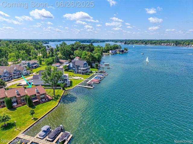 2226 Bowles St, Fenton, MI 48430 - aerial perspective of suburban area featuring a large body of water