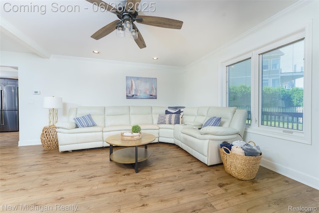 2226 Bowles St, Fenton, MI 48430 - living area featuring healthy amount of natural light, crown molding, light wood finished floors, ceiling fan, and recessed lighting