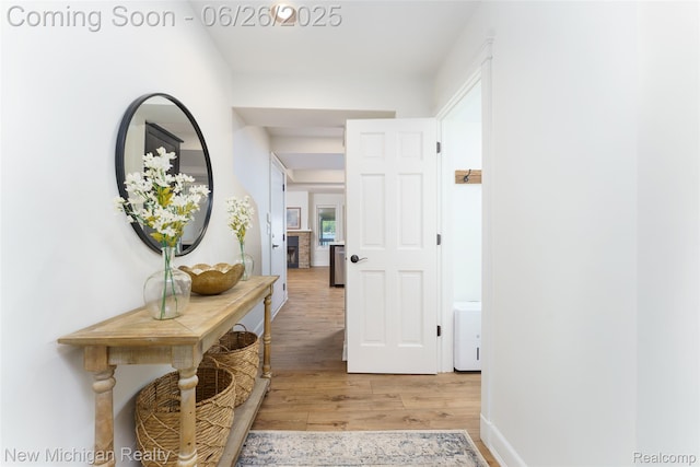 2226 Bowles St, Fenton, MI 48430 - hall with light wood finished floors and baseboards