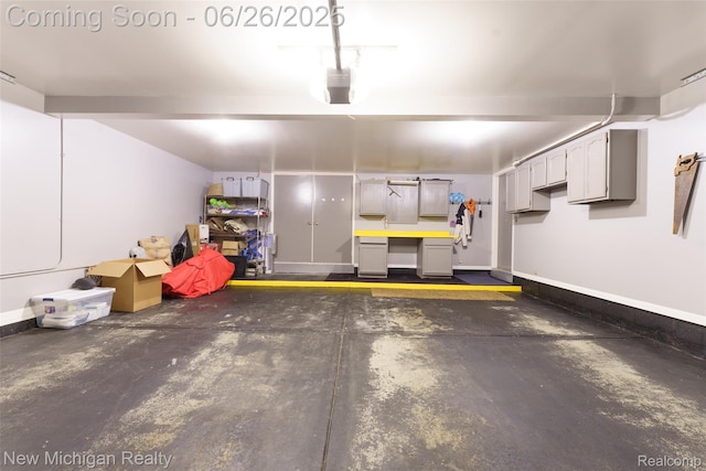 2226 Bowles St, Fenton, MI 48430 - garage featuring baseboards