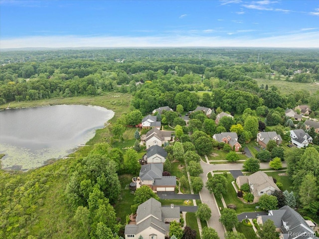 5390 Plantation Dr, Commerce Twp, MI 48382 - aerial perspective of suburban area featuring a heavily wooded area and a large body of water