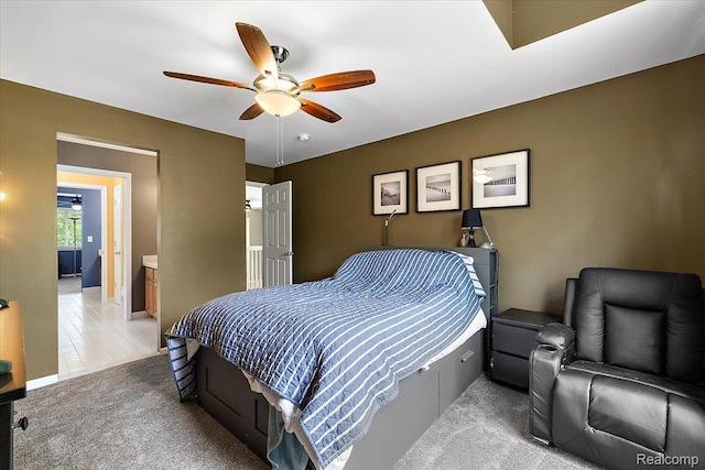 5390 Plantation Dr, Commerce Twp, MI 48382 - carpeted bedroom with a ceiling fan and baseboards