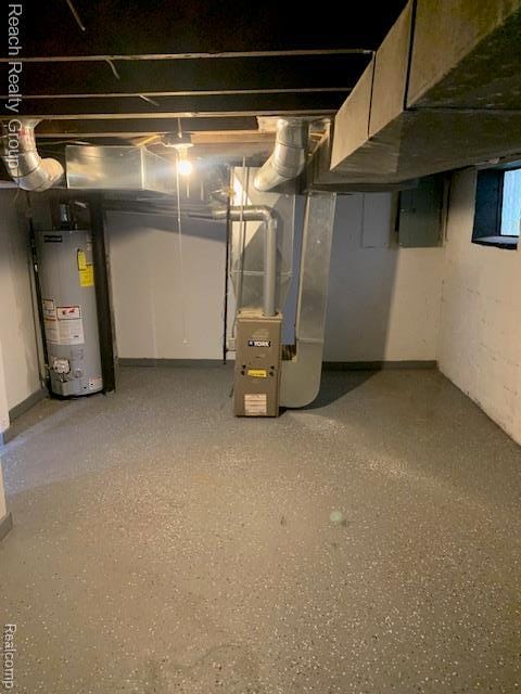 12066 N Martindale St, Detroit, MI 48204 - unfinished below grade area with water heater, heating unit, and electric panel