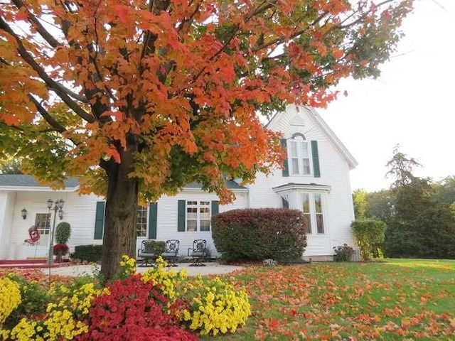 1532 34th St, Allegan, MI 49010 - obstructed view of property featuring a front yard