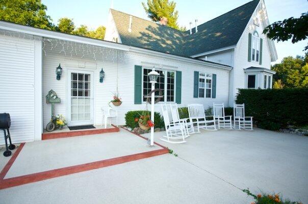 1532 34th St, Allegan, MI 49010 - back of house featuring a patio area