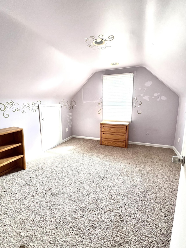 343 Bush Ave, Grand Blanc, MI 48439 - additional living space featuring lofted ceiling and carpet flooring