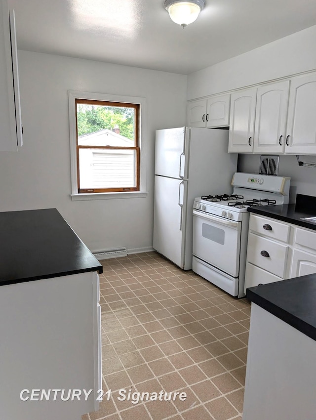 3344 Osler Ave, Saginaw, MI 48602 - kitchen featuring white range with gas stovetop, dark countertops, white cabinets, and baseboard heating