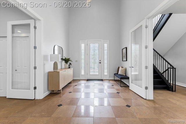 3440 Lone Pine Rd, West Bloomfield, MI 48323 - foyer entrance with a high ceiling and stairs