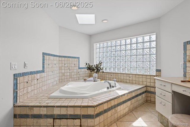 3440 Lone Pine Rd, West Bloomfield, MI 48323 - bathroom with a bath, a skylight, vanity, and tile patterned flooring