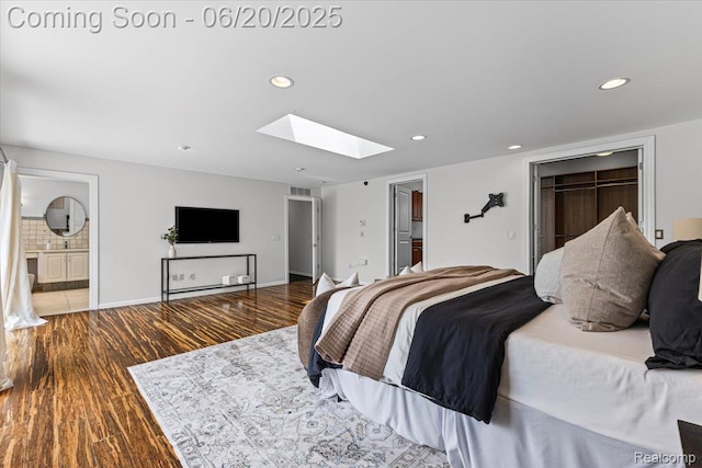 3440 Lone Pine Rd, West Bloomfield, MI 48323 - bedroom with a skylight, wood finished floors, recessed lighting, a closet, and ensuite bathroom