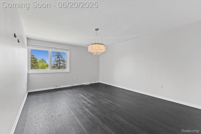 3440 Lone Pine Rd, West Bloomfield, MI 48323 - spare room featuring a chandelier and dark wood-style flooring
