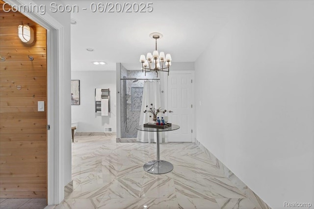 3440 Lone Pine Rd, West Bloomfield, MI 48323 - corridor featuring a chandelier, marble finish flooring, and recessed lighting