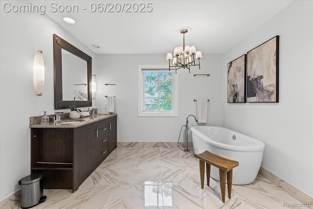 3440 Lone Pine Rd, West Bloomfield, MI 48323 - full bath with a soaking tub, double vanity, marble finish flooring, and a chandelier