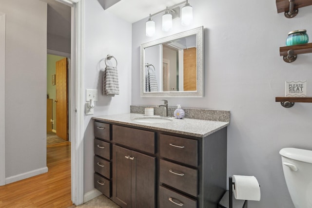 70838 Ridgewood Dr, Edwardsburg, MI 49112 - bathroom with vanity and wood finished floors
