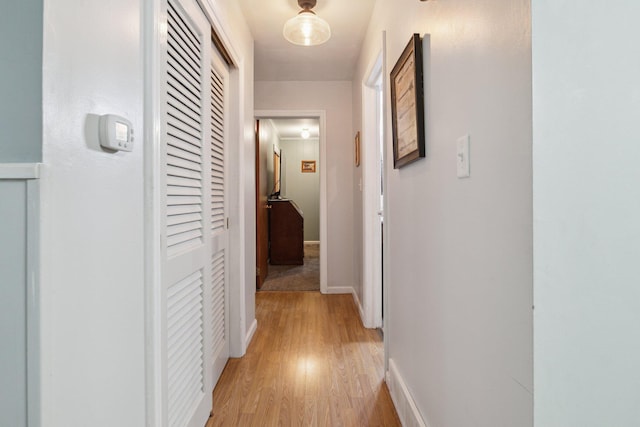 70838 Ridgewood Dr, Edwardsburg, MI 49112 - corridor featuring light wood finished floors and baseboards