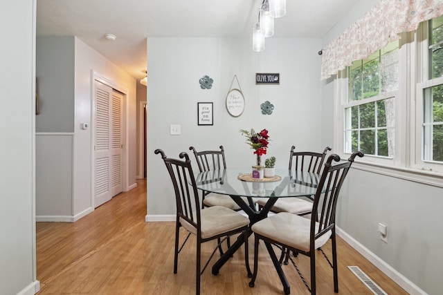 70838 Ridgewood Dr, Edwardsburg, MI 49112 - dining space with light wood finished floors and baseboards