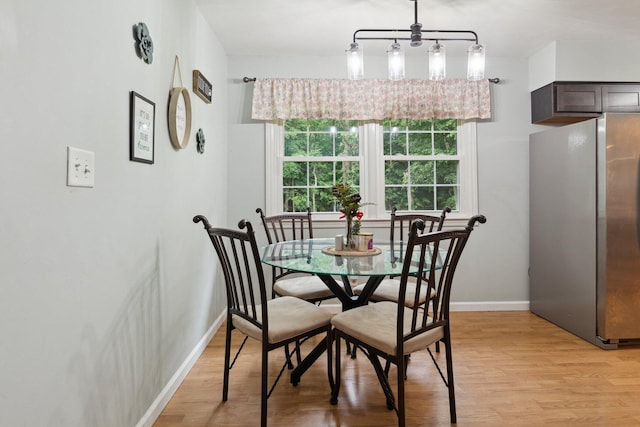 70838 Ridgewood Dr, Edwardsburg, MI 49112 - dining area with light wood-type flooring