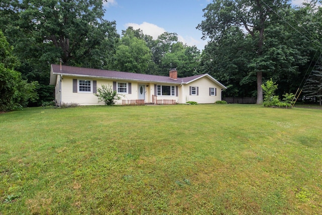 70838 Ridgewood Dr, Edwardsburg, MI 49112 - ranch-style home with a front yard and a chimney