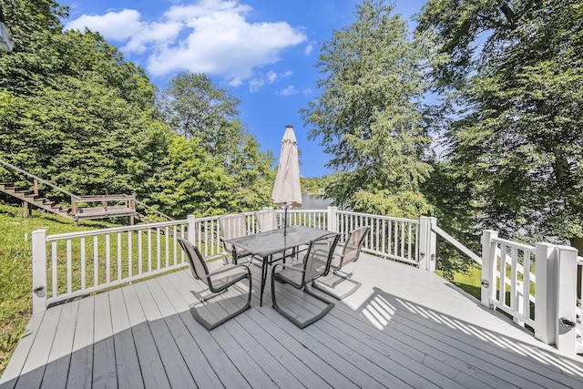 13674 Lenore Dr, Hudson, MI 49247 - wooden deck featuring outdoor dining area