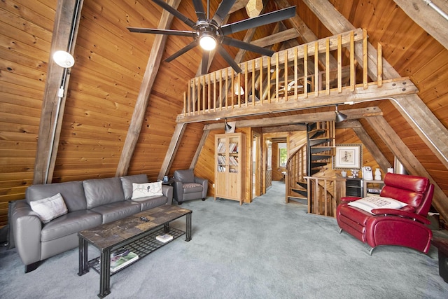 13674 Lenore Dr, Hudson, MI 49247 - carpeted living area featuring a ceiling fan, wood walls, and wooden ceiling