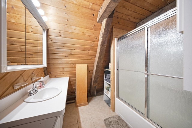 13674 Lenore Dr, Hudson, MI 49247 - full bathroom featuring wooden walls, vanity, tile patterned flooring, and bath / shower combo with glass door