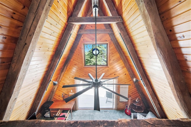 13674 Lenore Dr, Hudson, MI 49247 - detailed view of a wood ceiling with exposed beams, wood walls, and carpet