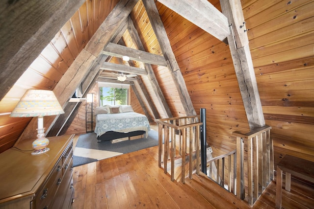 13674 Lenore Dr, Hudson, MI 49247 - bedroom with hardwood / wood-style flooring, wood walls, and wooden ceiling