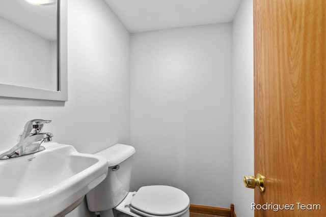 1235 Aurora Ave, Muskegon, MI 49442 - bathroom with a sink and toilet