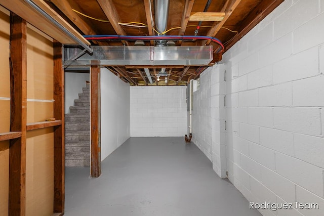 1235 Aurora Ave, Muskegon, MI 49442 - unfinished below grade area featuring stairs