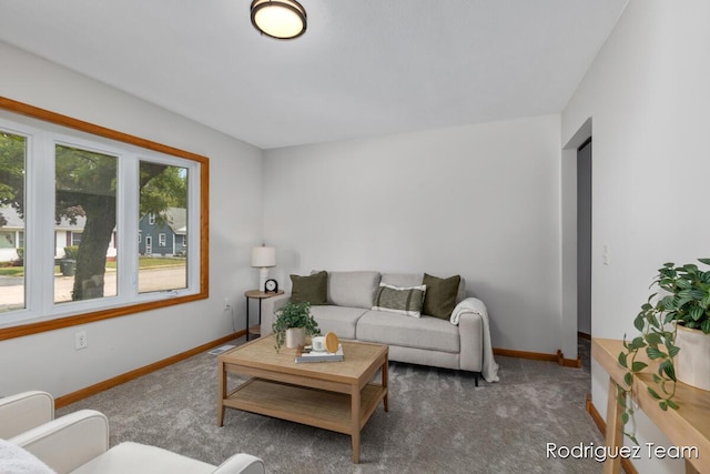 1235 Aurora Ave, Muskegon, MI 49442 - living room featuring carpet floors