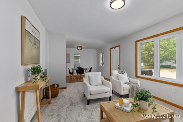 1235 Aurora Ave, Muskegon, MI 49442 - living room with plenty of natural light and light colored carpet