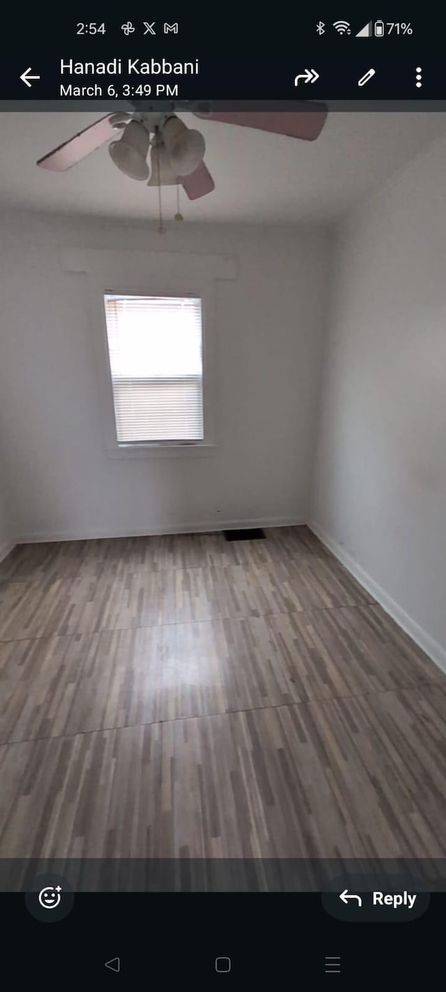 7761 Artesian St, Detroit, MI 48228 - unfurnished room featuring ceiling fan and wood finished floors