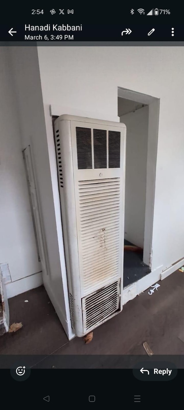 7761 Artesian St, Detroit, MI 48228 - detailed view of a heating unit and baseboards