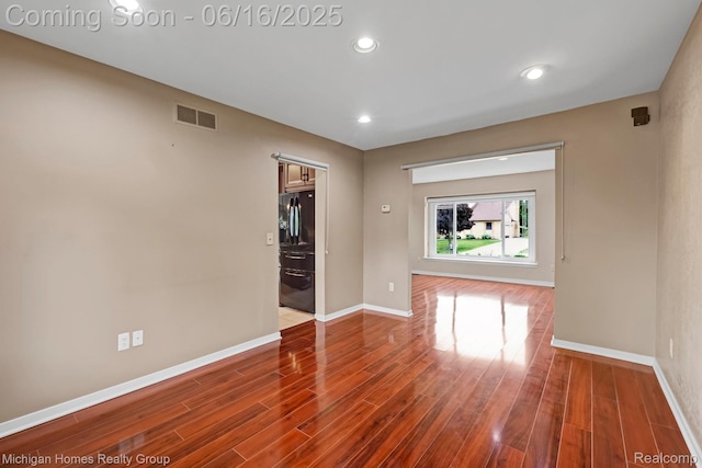 34516 Bunker Hill Dr, Farmington, MI 48331 - spare room featuring wood finished floors and recessed lighting