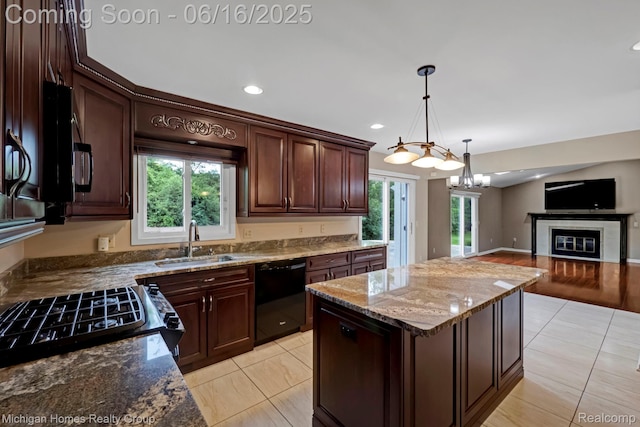 34516 Bunker Hill Dr, Farmington, MI 48331 - kitchen with dishwasher, light tile patterned floors, healthy amount of natural light, and recessed lighting