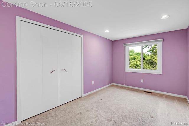 34516 Bunker Hill Dr, Farmington, MI 48331 - unfurnished bedroom featuring carpet floors, recessed lighting, and a closet