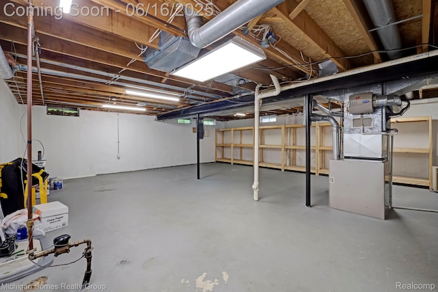 34516 Bunker Hill Dr, Farmington, MI 48331 - unfinished basement featuring heating unit