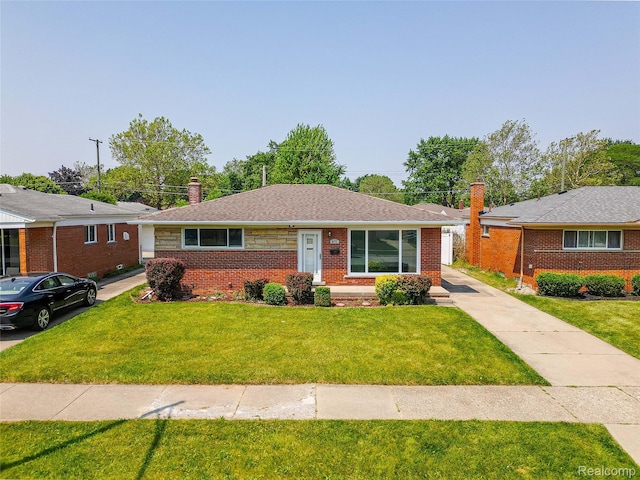8177 Gary Ave, Westland, MI 48185 - bungalow-style house featuring a chimney, a front yard, brick siding, and a shingled roof