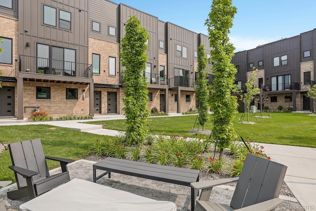 1058 Hampton Cir Unit 74, Detroit, MI 48207 - view of property's community with a lawn