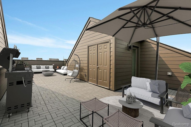 1058 Hampton Cir Unit 74, Detroit, MI 48207 - view of patio / terrace featuring outdoor lounge area